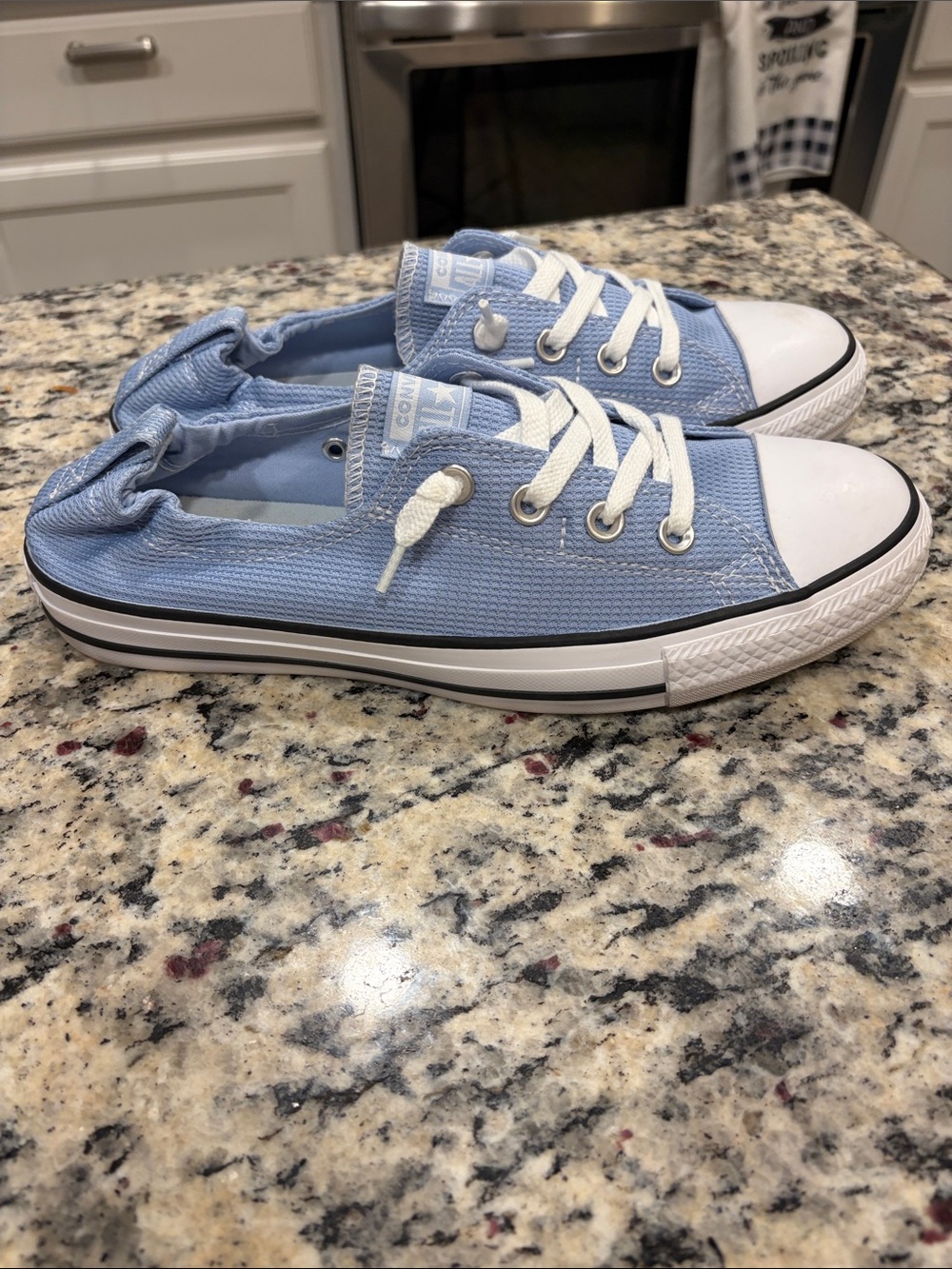 Converse Light Blue Canvas Slip-On Sneakers with White Toe